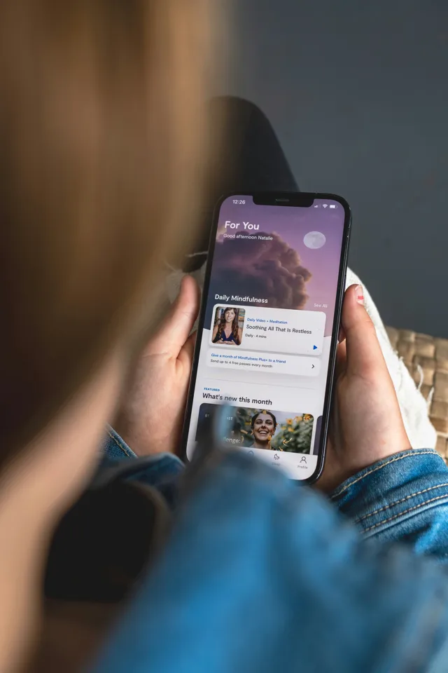 A smartphone app open in someone's hand