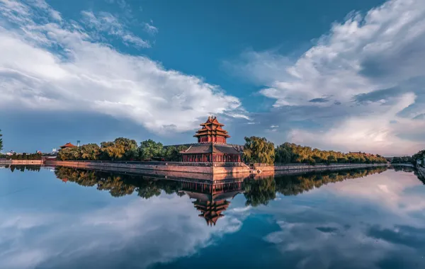 The Forbidden City corner tower reflected in water, Beijing