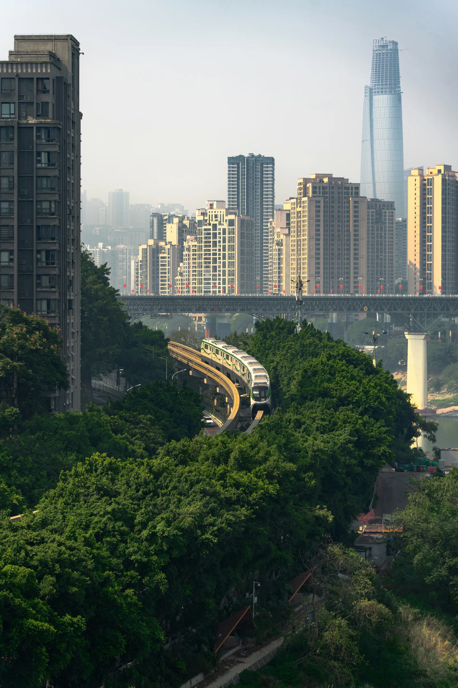 Chongqing’s futuristic cityscape under low river mist