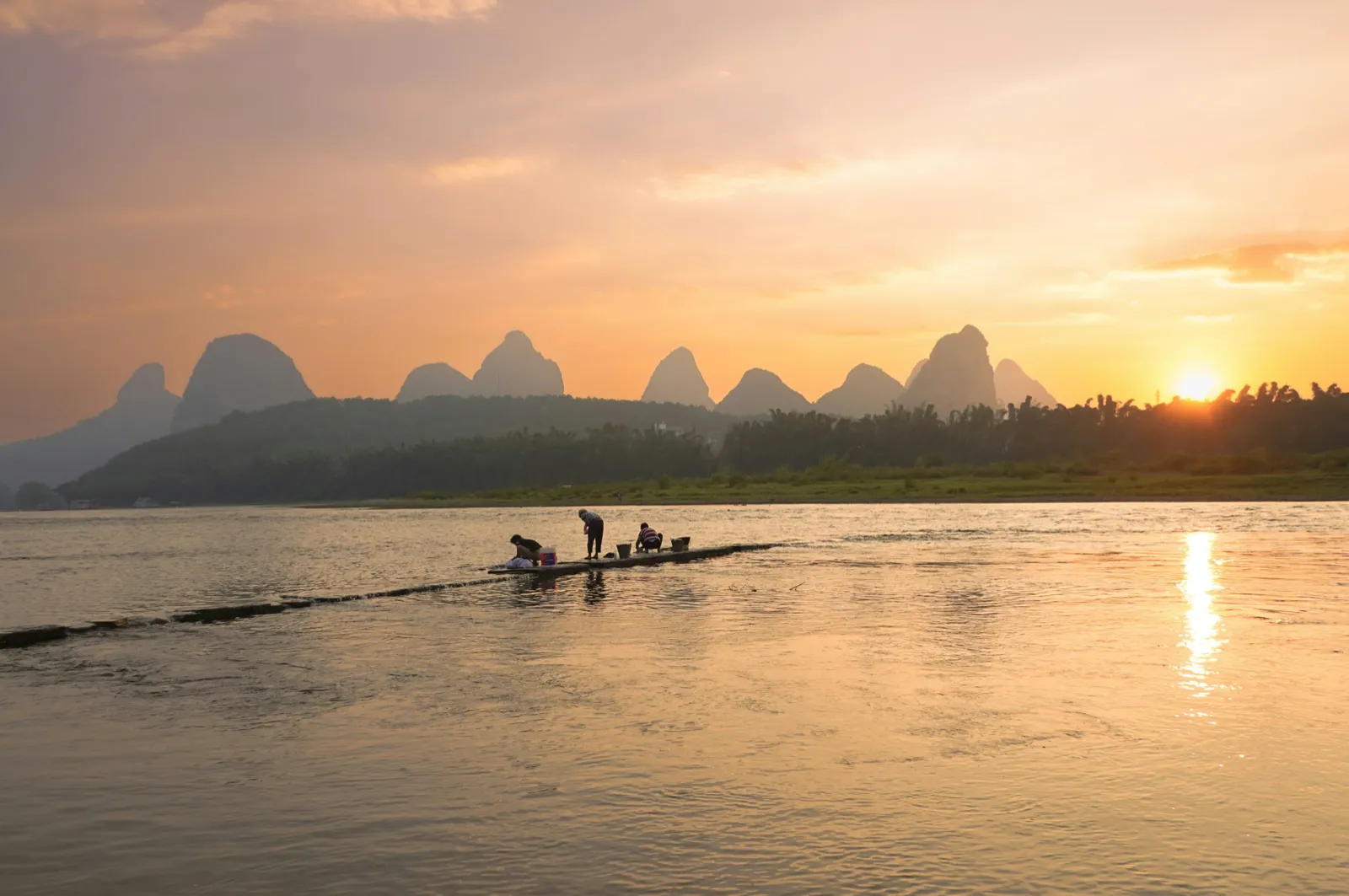 Terraced fields below karst mountains in Guangxi