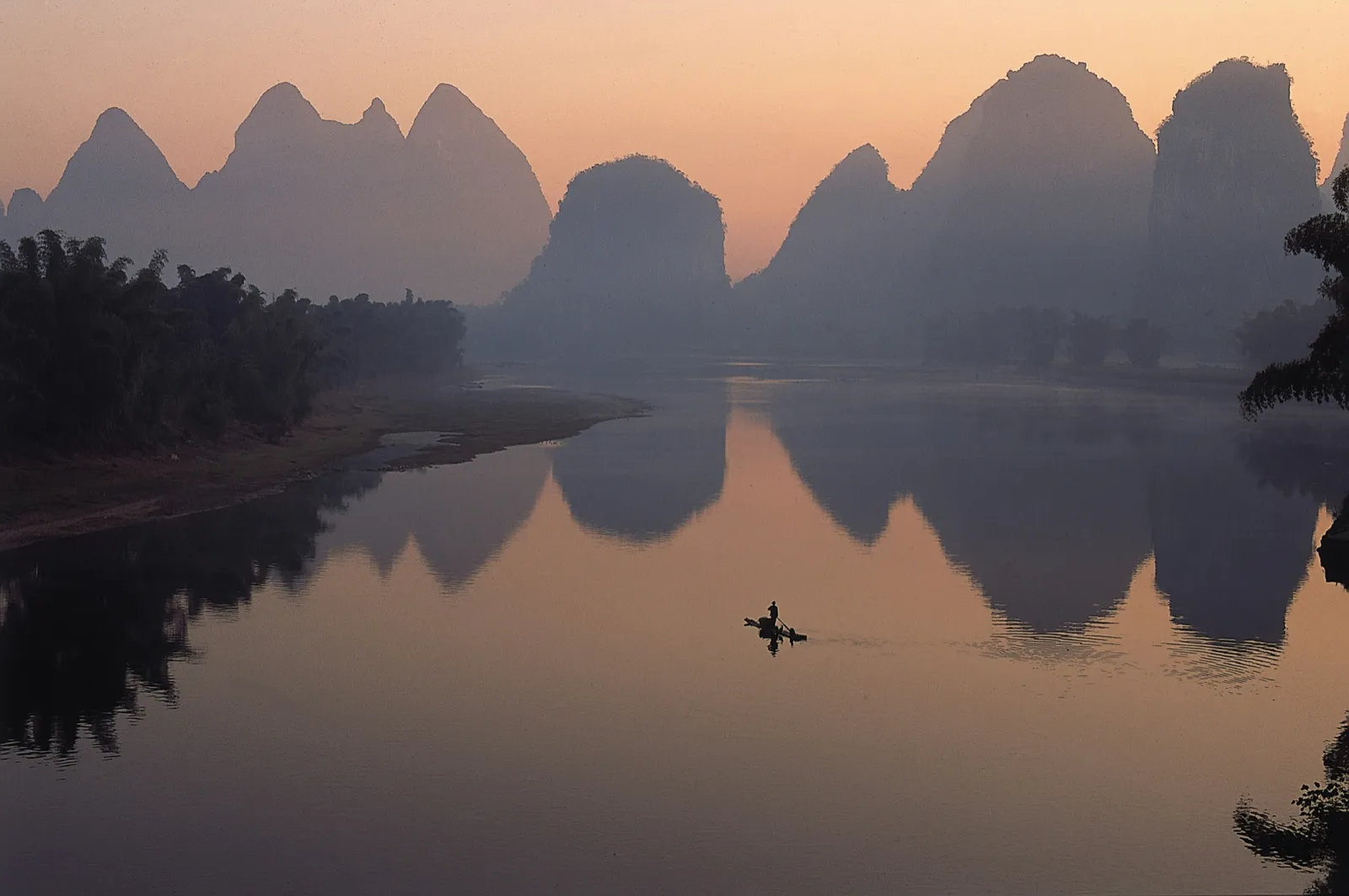 The Li River winding between green karst peaks near Yangshuo