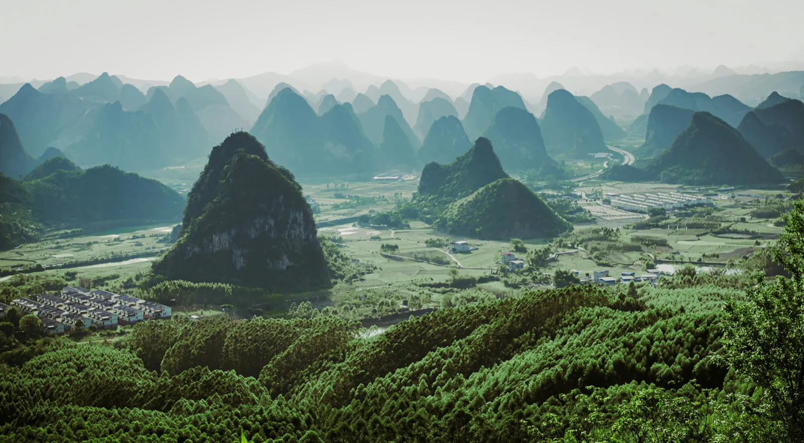 Green karst peaks above the Li River near Yangshuo